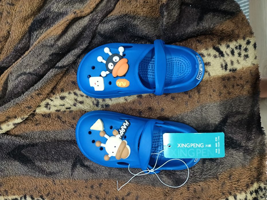 Продам кроксы новые