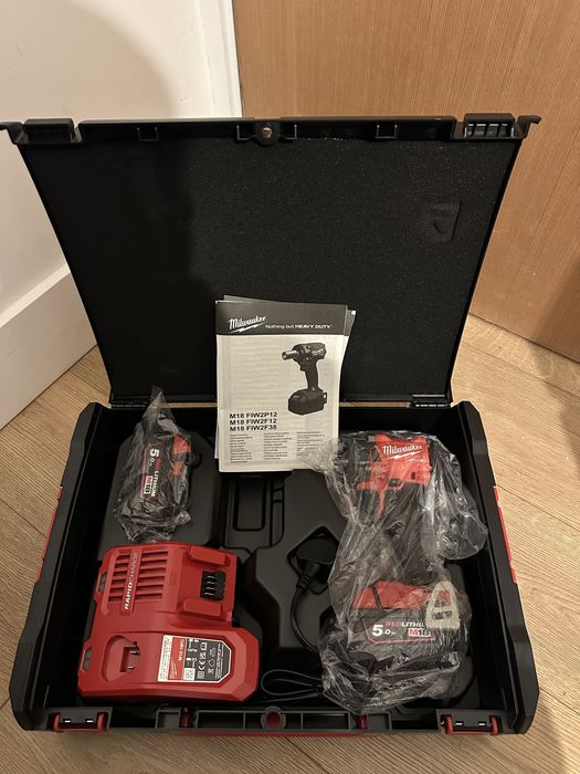 Pistol de impact Milwaukee FUEL BRUSHLESS M18 FIW2F38 cu doua baterii de 5ah , încărcător si valiză de transport , produs absolut nou , fab 2026
