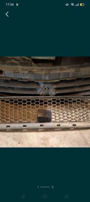 Продам решетки в бампер на логан 1 оригинал