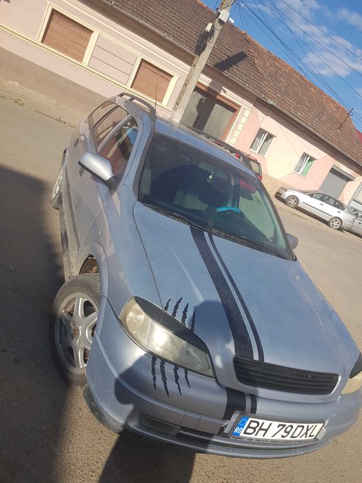 Vand sau schimb opel astra g pret  fixx