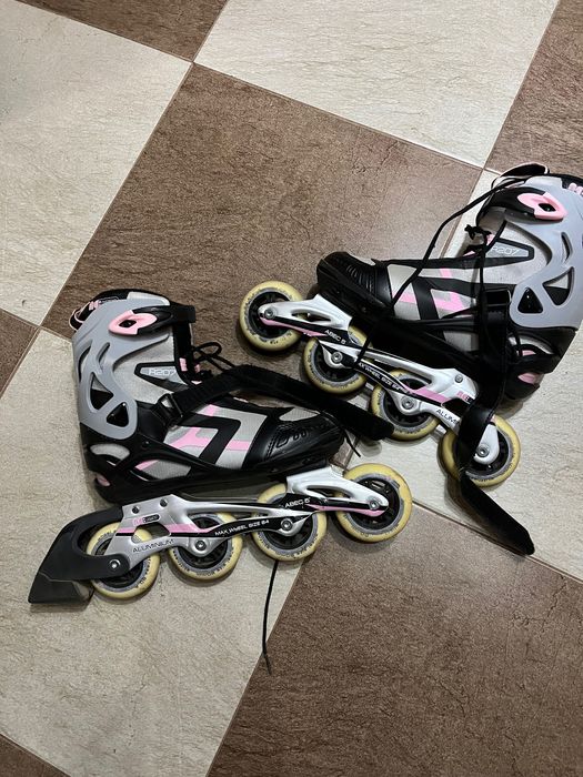 Роликовые коньки
