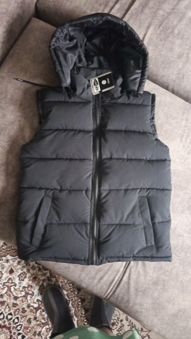 Продам новые жилетки
