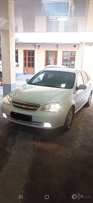 Laseti 1.8 2009 yil rangi oq kraskasi tozza 19 ming yurgan beyzinda