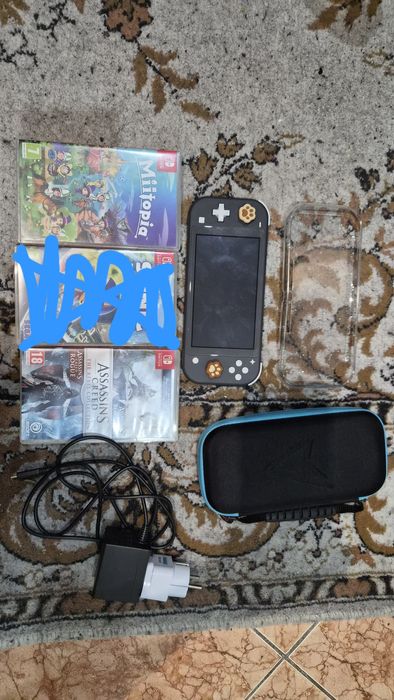 Nintendo Switch Lite Grey + Accesorii + 2 jocuri