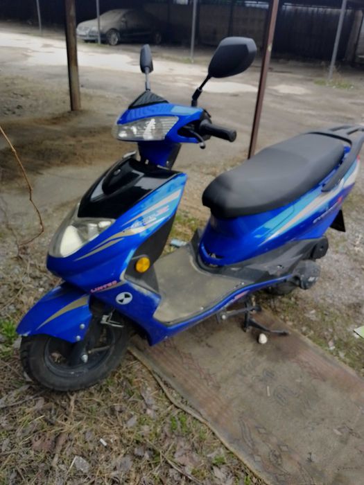 продам скутер цвет сине чёрный Ymaha СYGUNS Z KT49T-39