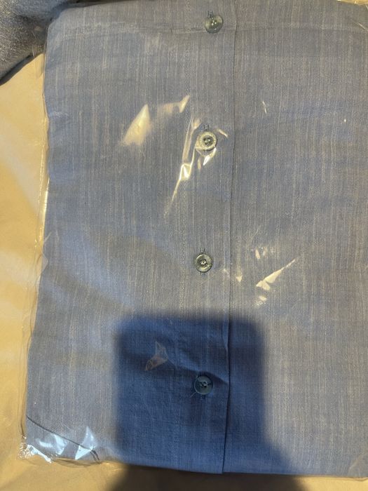 Жилетка нова и риза чисто нова
