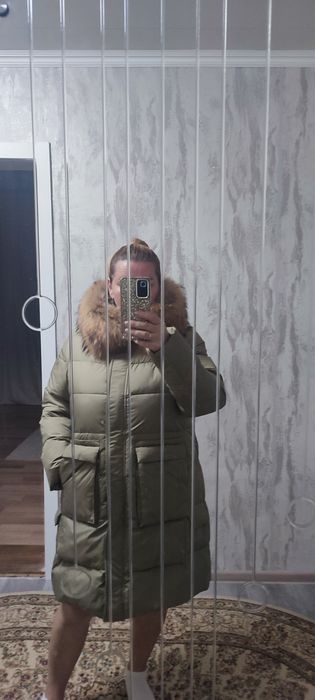Пуховик женский зимний .