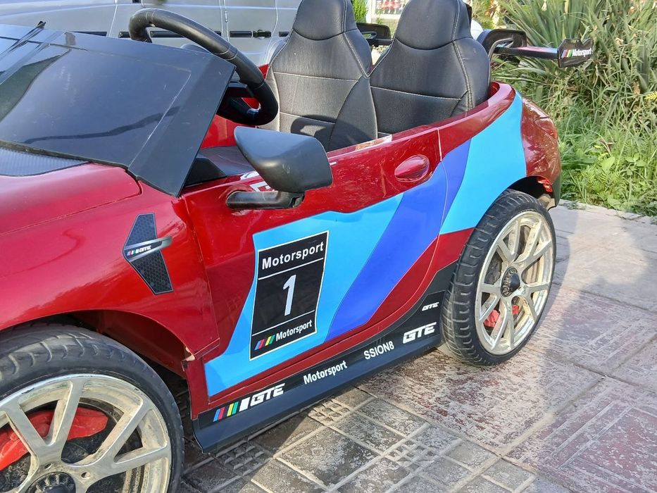 BMW bolalar mashinasi