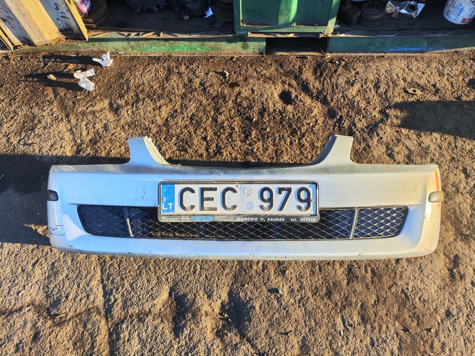 Передний бампер мазда 323