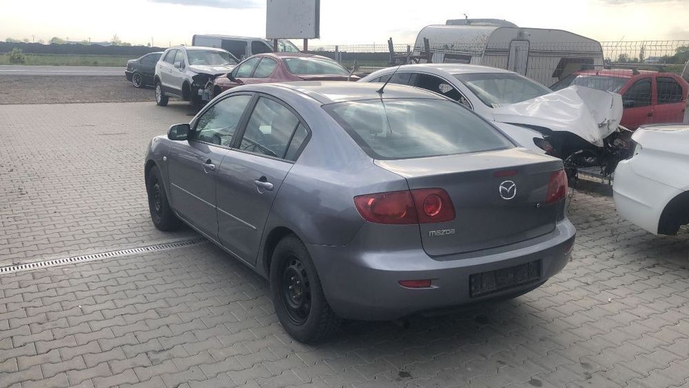 Dezmembram Mazda 3 Sedan 1.6 benzina an fabr 2006