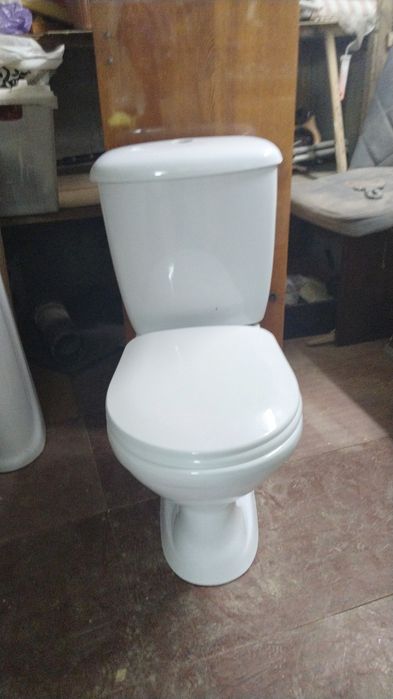 Продам унитаз и тюльпан