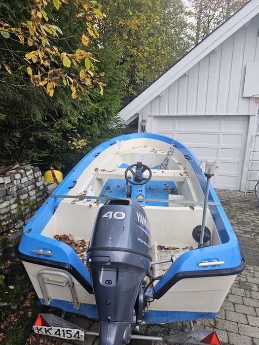 Лодка,мотор и колесар