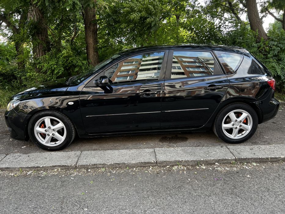 Mazda 3 1.6d 109кс