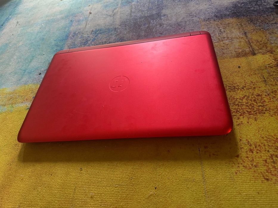 laptop Hp rosu, quadcore , video dediacat 1 gb , hdd 1tb