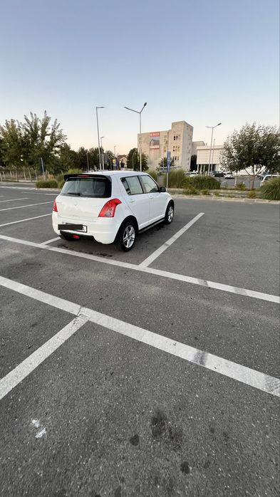 Suzuki Swift 1.3 Benzină 2008 • 197.000 km • Climatizare • Aero Kit