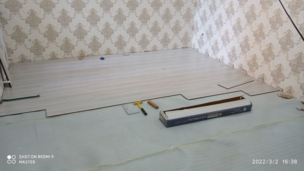 Укладка ламината , качественно.