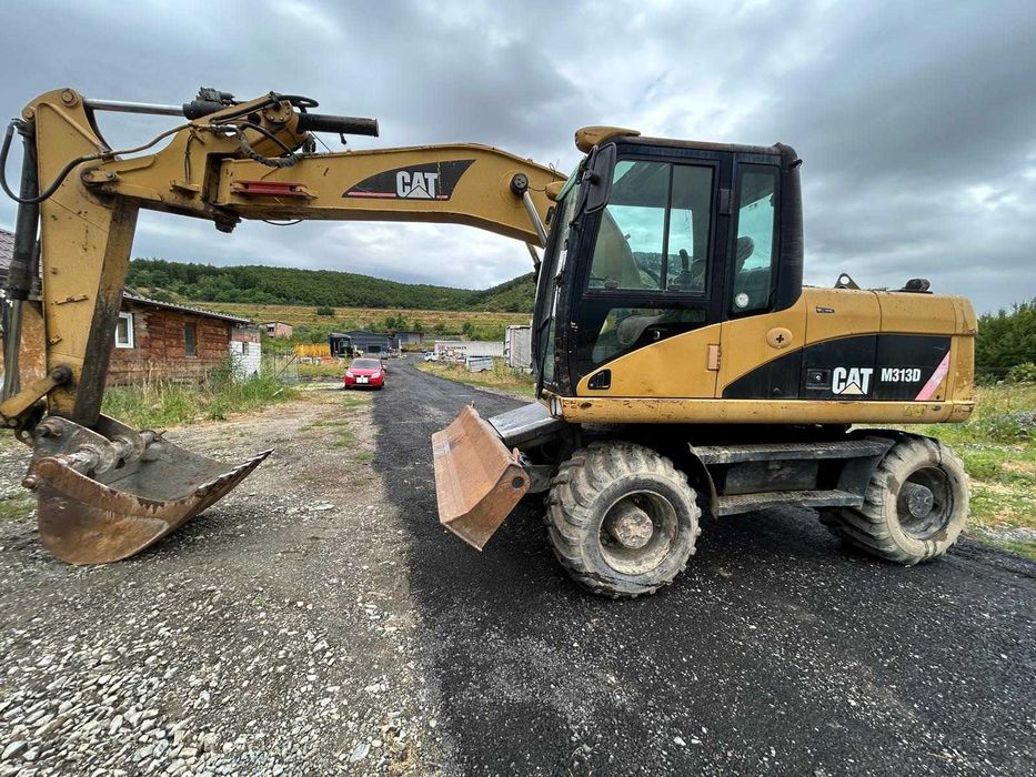 Excavator pe roti CAT M313D