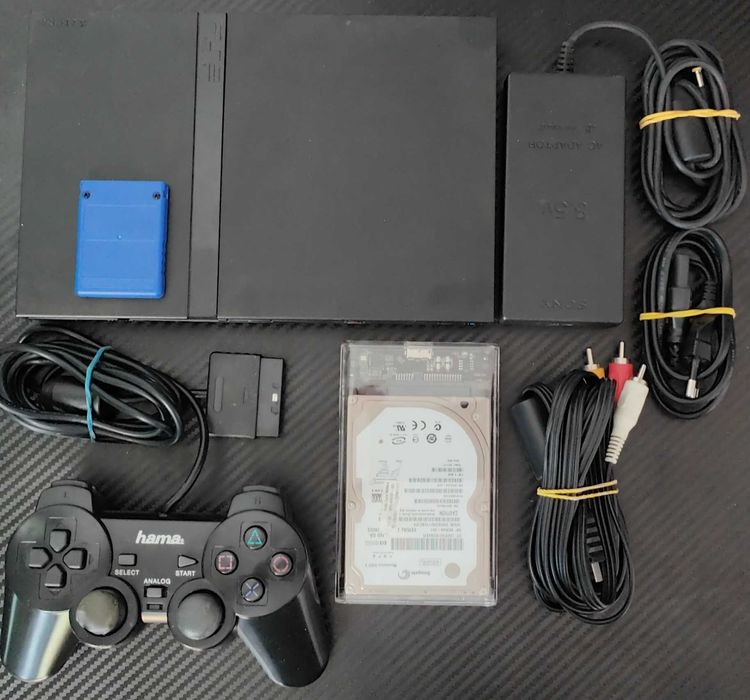 Playstation 2 model slim,modat, cu 33 jocuri de top ,maneta ,cabluri