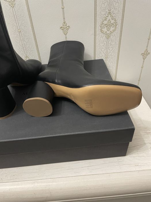 Продам женские сапоги.