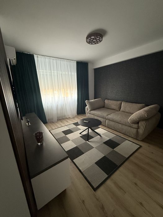 Inchiriez apartament o camera nou , alfa , arad !