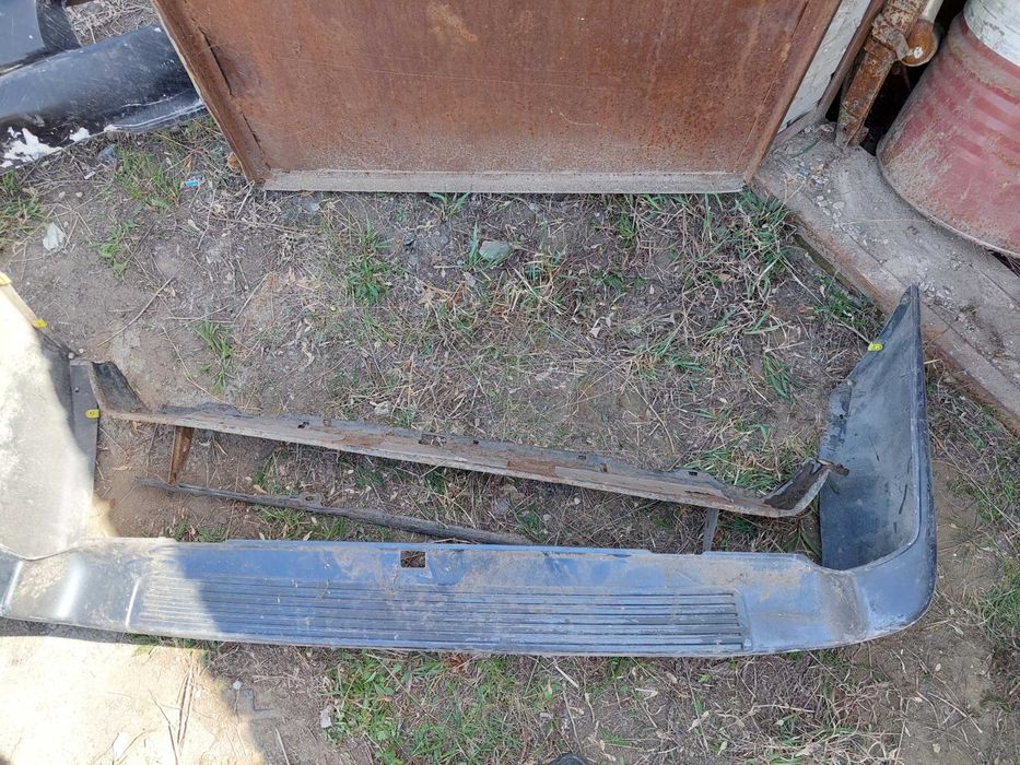 Задний бампер  на LC100