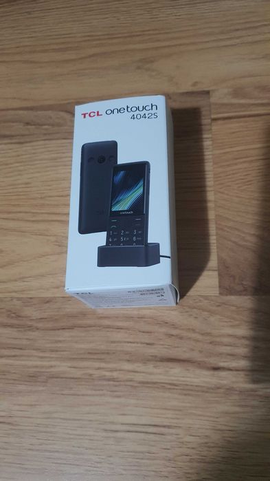 Продавам чисто нов (запечатан) телефон TCL ONETOUCH 4042S