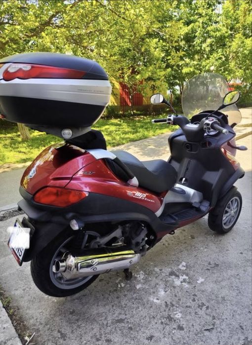 Piaggio mp3 400cc lt se conduce cu B
