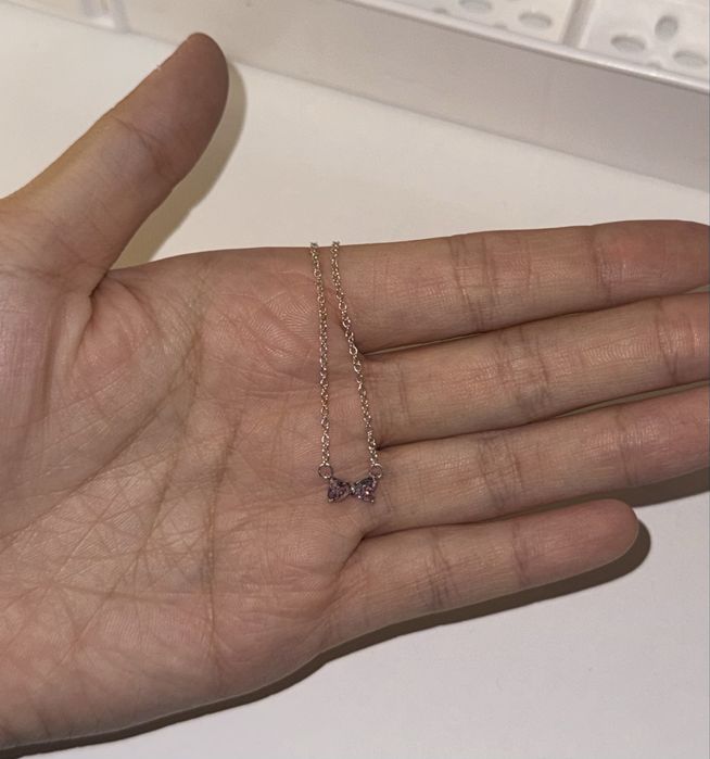 Серебряное колье розовый бант