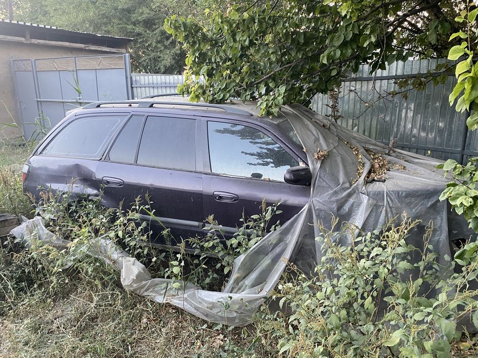 Мазда 626 в аварином состоянии