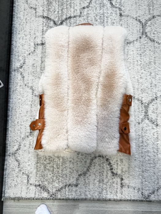 Дамски пухен елек