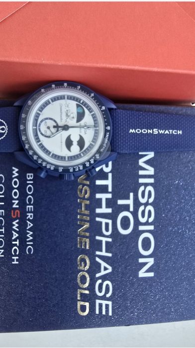 Swatch Omega Mission to Earthpase Moonshine Gold 
Ce