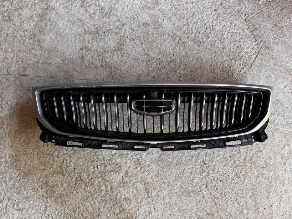 Решотка Geely Emgrand