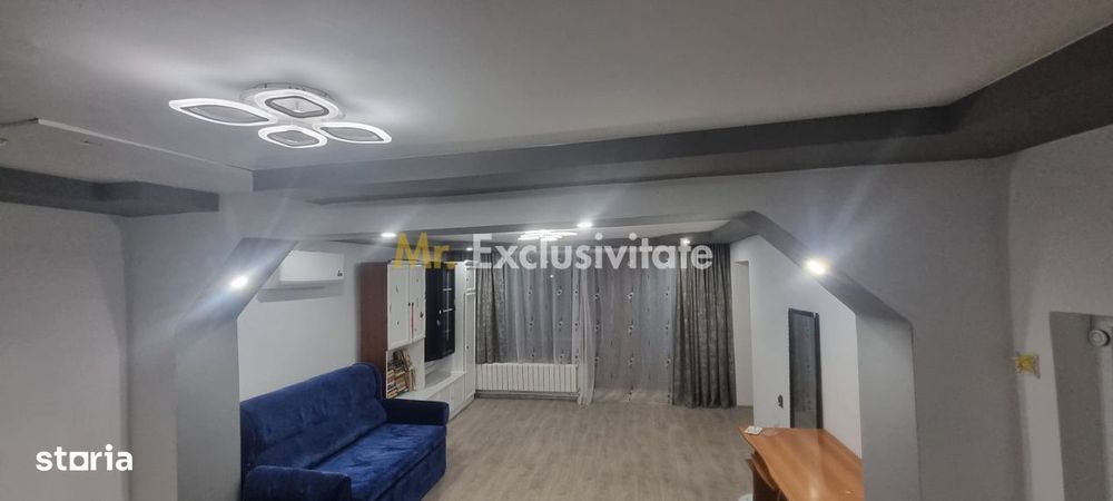 Casă P+M cu 1.558 mp teren, livadă și garaj