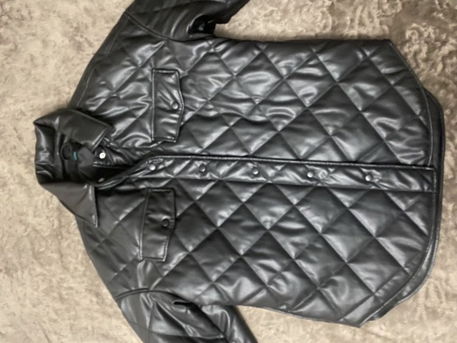 Стеганная кож куртка