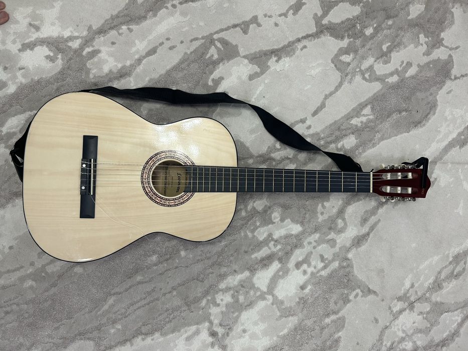 Гитара жаңа 2 ай қолдандық