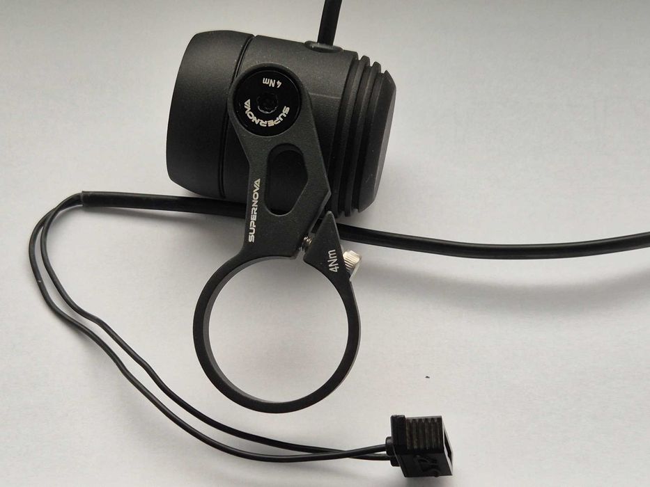 Butuc față cu dinam SP PL-7 + far bicicleta Supernova E3 Pure 3 HBM