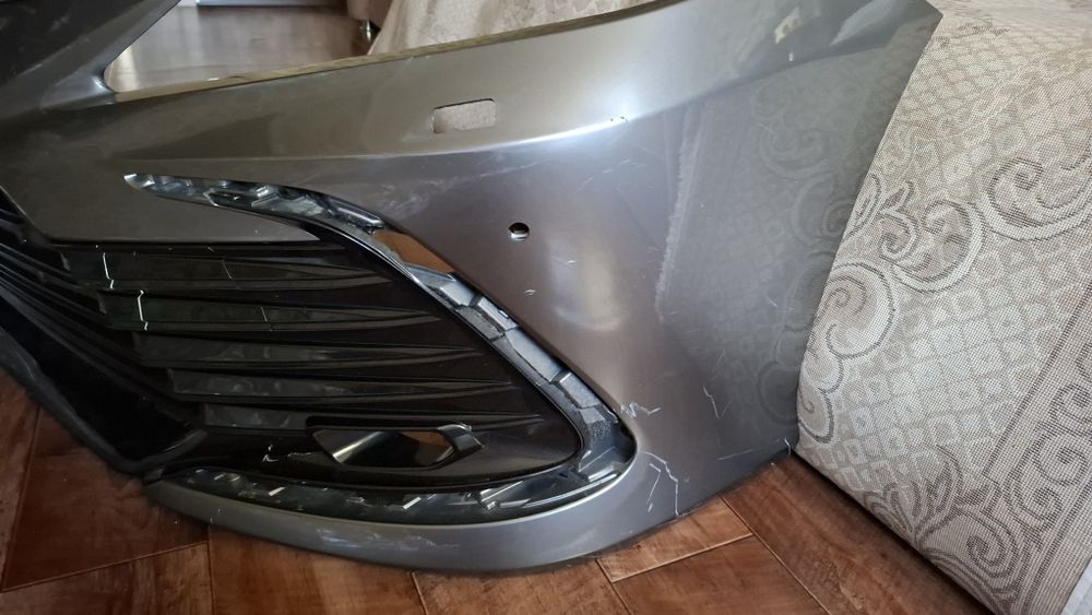 Передний бампер Toyota Camry