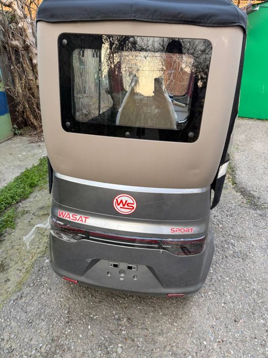 Электроскутер трехколесный