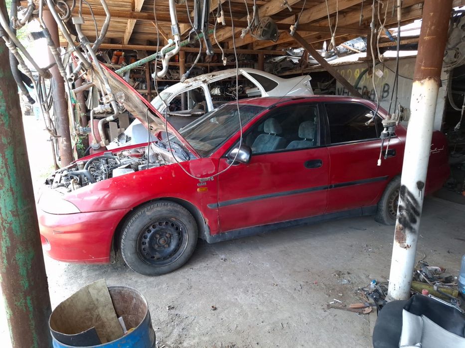Разбираем Mitsubishi Carisma