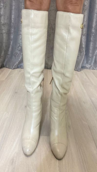 Женские сапоги..