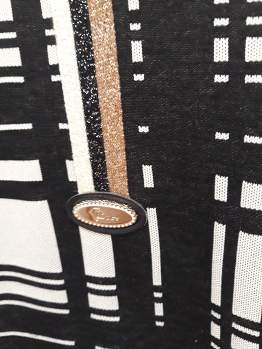 Елегантно сако на луци