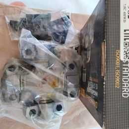 vand 2 seturi noi  de  cruci cardanice tractor  si 1 filtru ulei