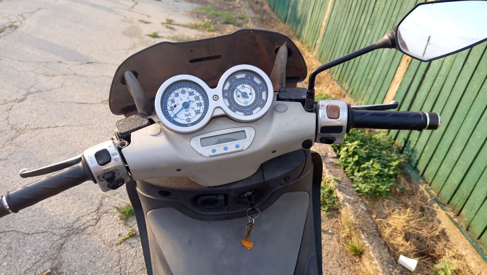 Скутер 125кубика