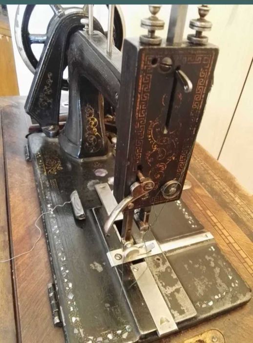 Masina veche de cusut Singer