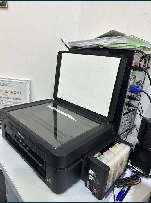 Epson L 210 rangli printer + skanner qiladi yaxshi ishlab turibdi doko