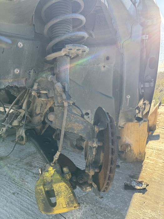 Fuzeta fata amortizor complet cu arc si flansa Ford Focus 3 2012-2018