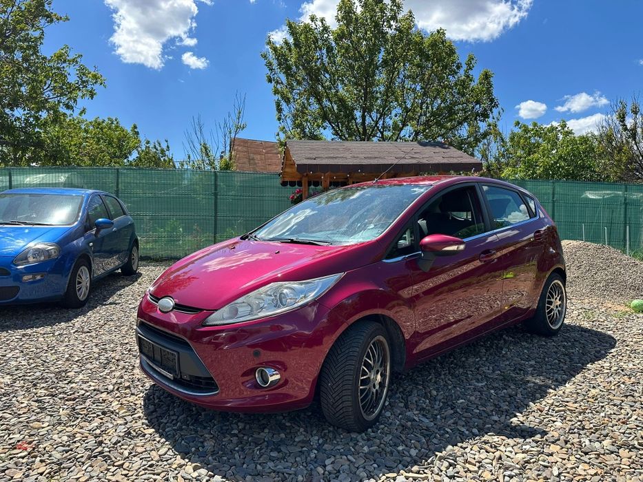 Ford Fiesta Titanium an 2009 pe Acte/ 1.6tdi-90cp/Navi/Climă/Adus Recent!