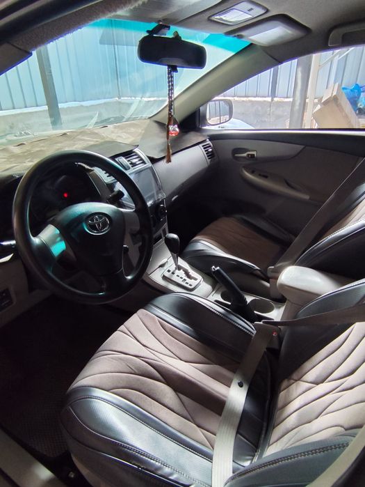 Машина Тайота каролла