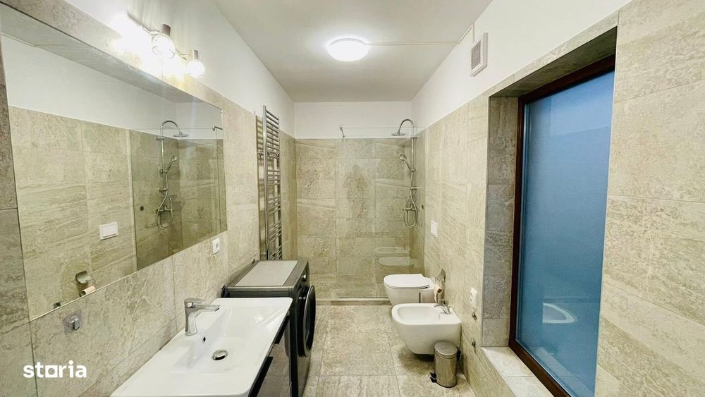 Casă  cu două apartamente și spațiu comercial,parter,etaj,etaj retras