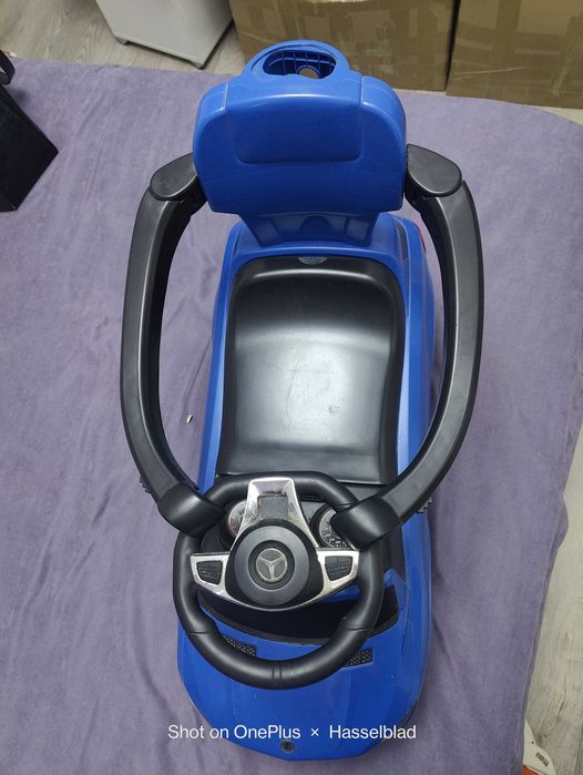 Машинка для катания детей.